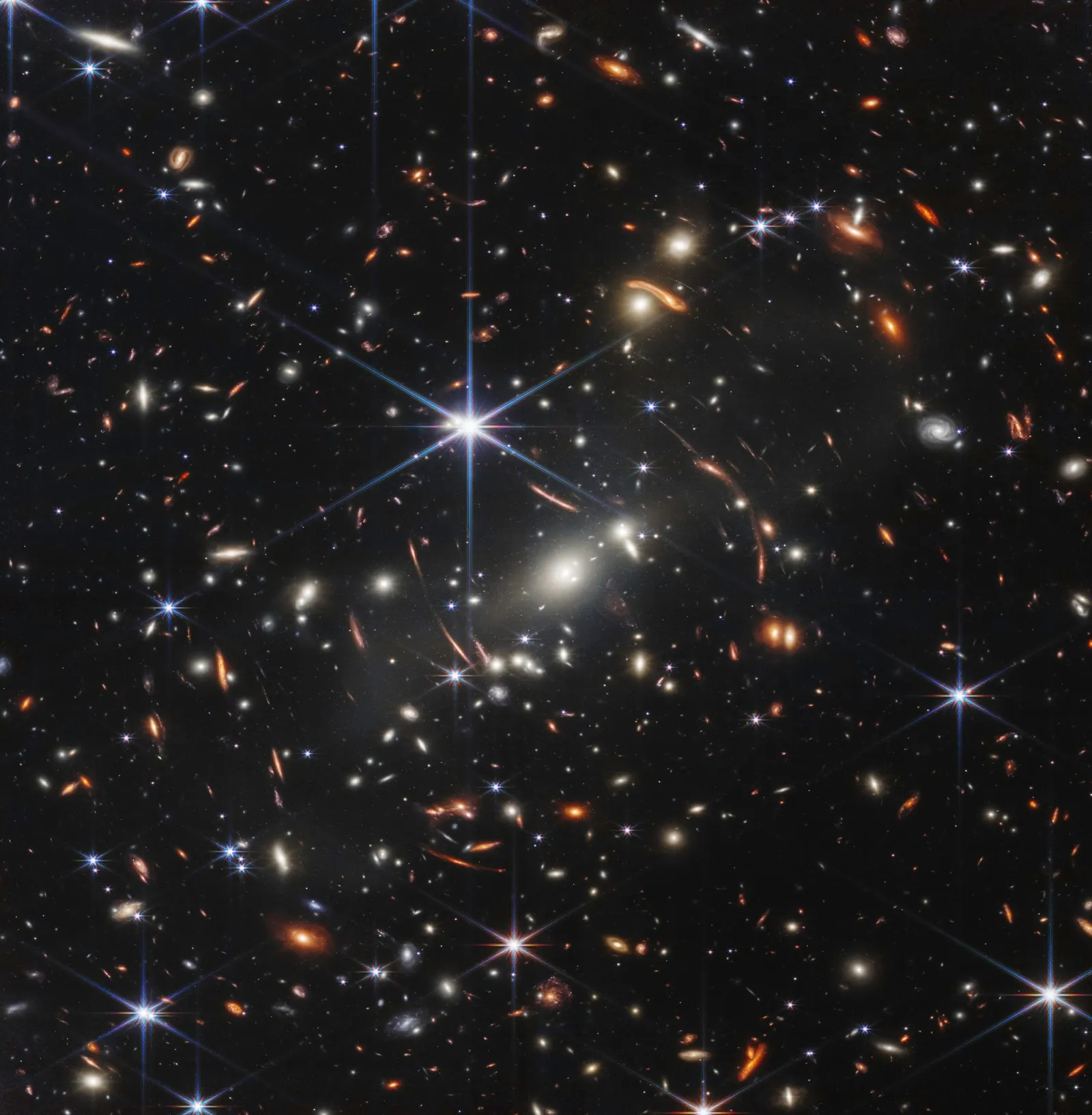 Imagem do Webb com milhares de galáxias de formas e cores variadas